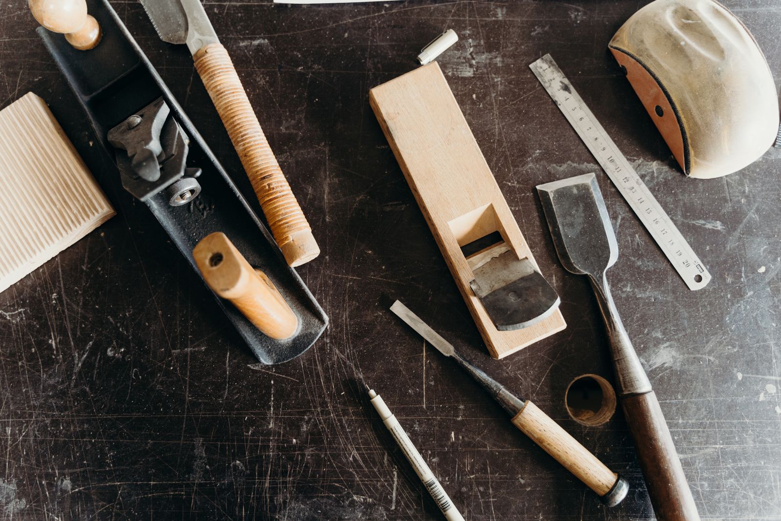 The Buildwell millwork shop with tools and a work bench